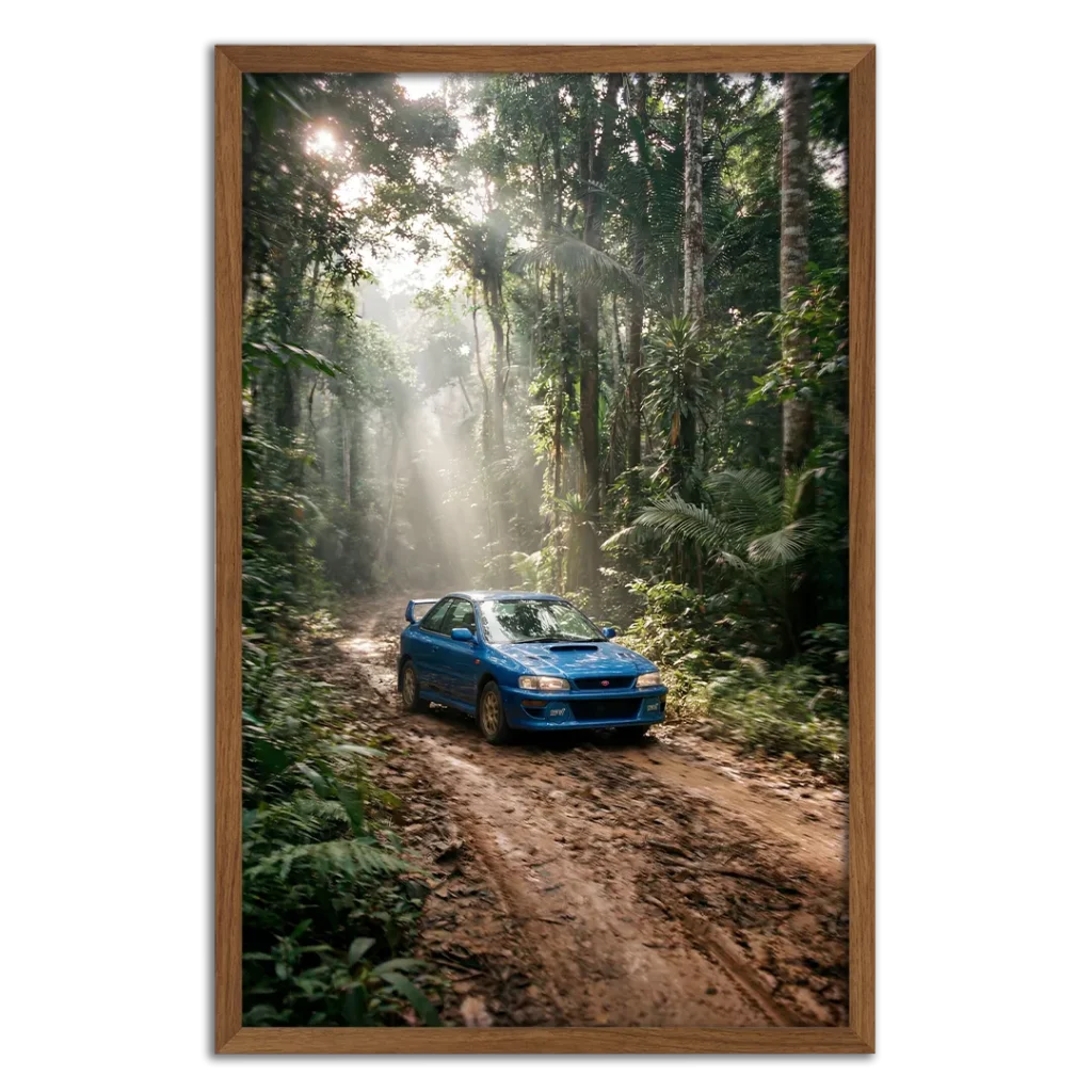 Photograph of a blue Subaru 22B STI driving in the jungle